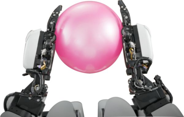 Ein T-HR3 hält einen pinken Ball mit seinen Roboterhänden.