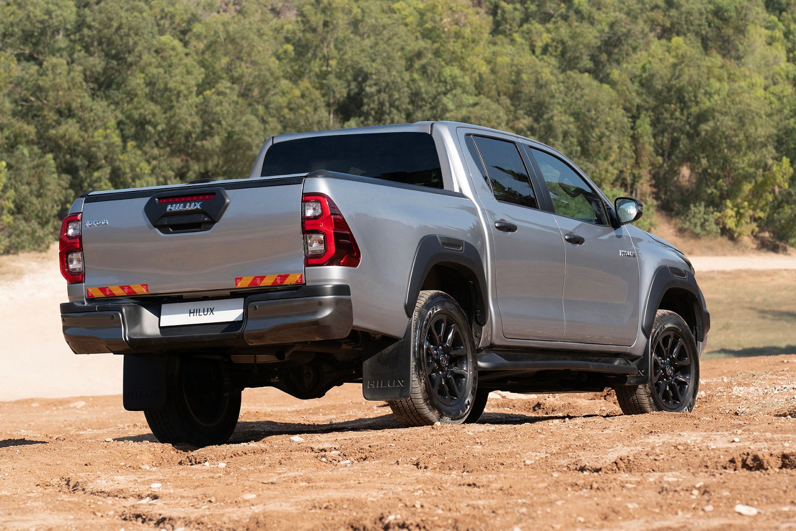 Hilux drives along an urban underpass