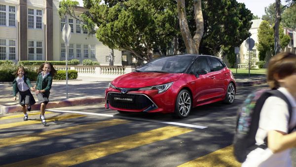 Toyota Corolla Hatchback stopped at zebra crossing