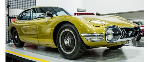 angled view of gold Toyota 2000GT