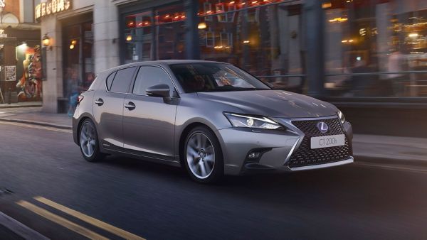 Lexus CT 200h driving down a road