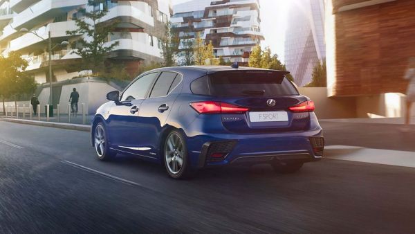 back shot of a Lexus CT 200h driving down a road