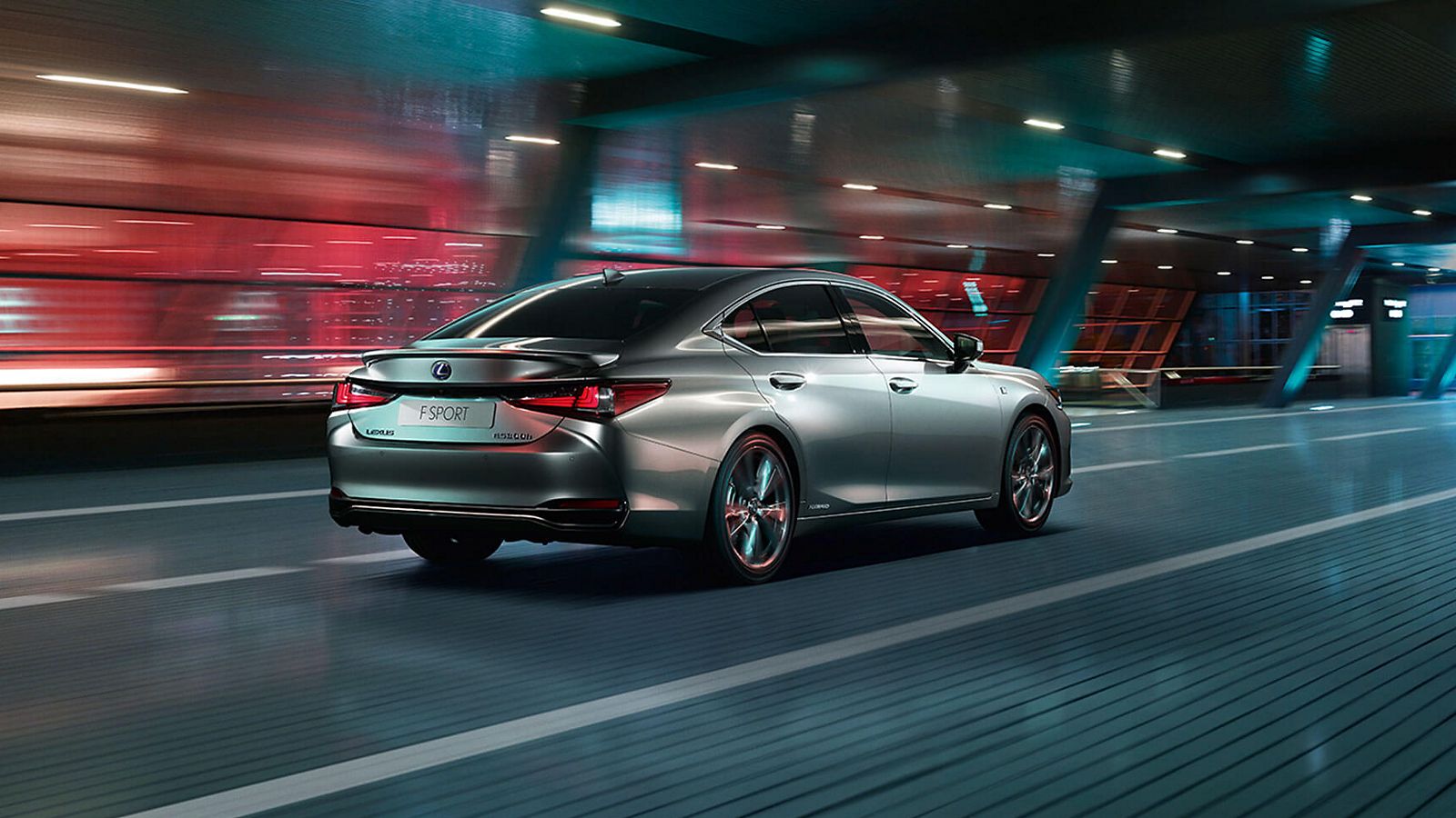 Lexus IS F Sport driving through a city location 