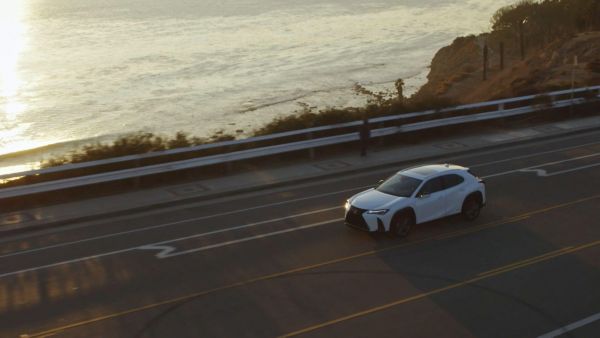 Lexus car driving along a road