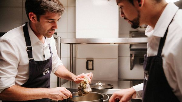 Sergio Barroso cooking in a kitchen