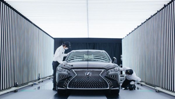 A Takumi master inspecting a Lexus