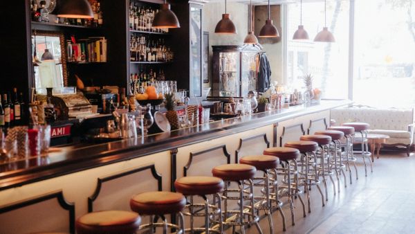 wide shot of a restaurant bar and seats