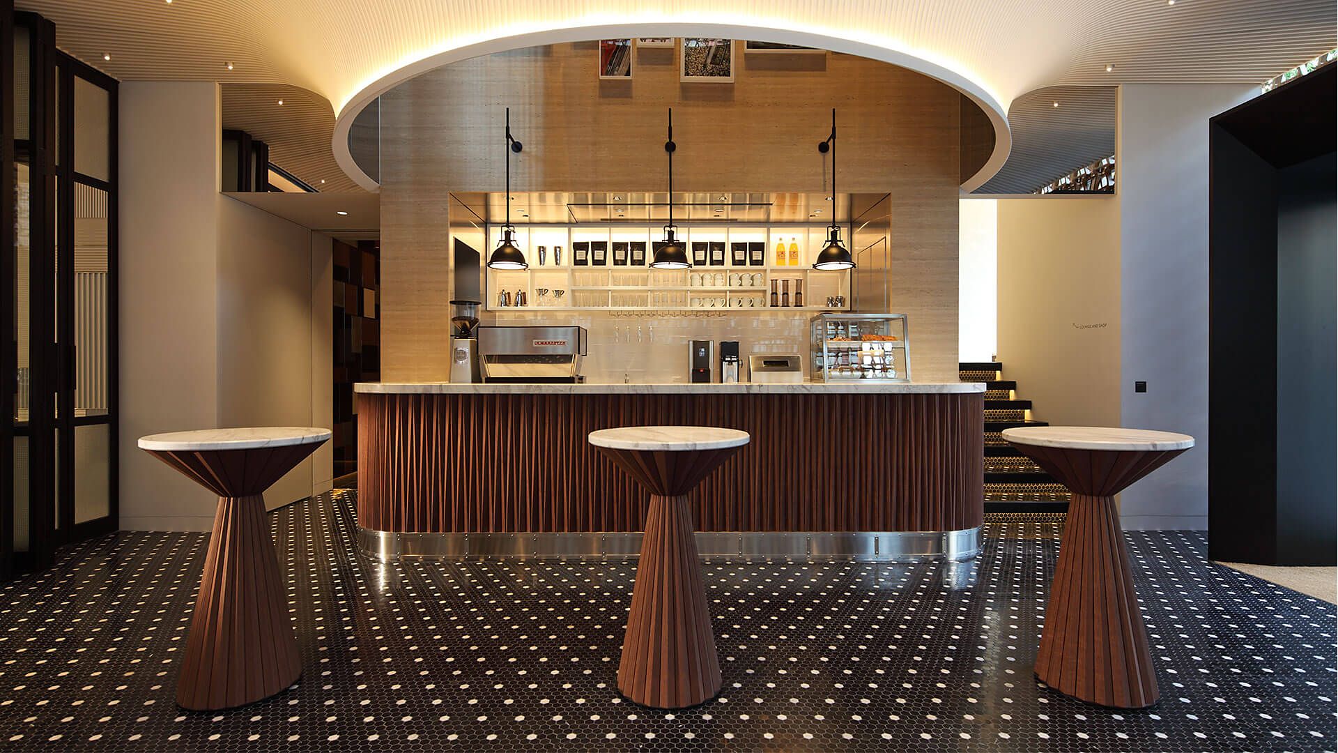 wide shot of different chairs in front of a canteen Intersect by Lexus Tokyo