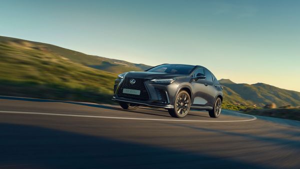 Lexus NX driving in a rural location