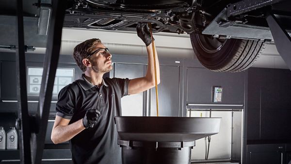 A Lexus mechanic working on a Lexus