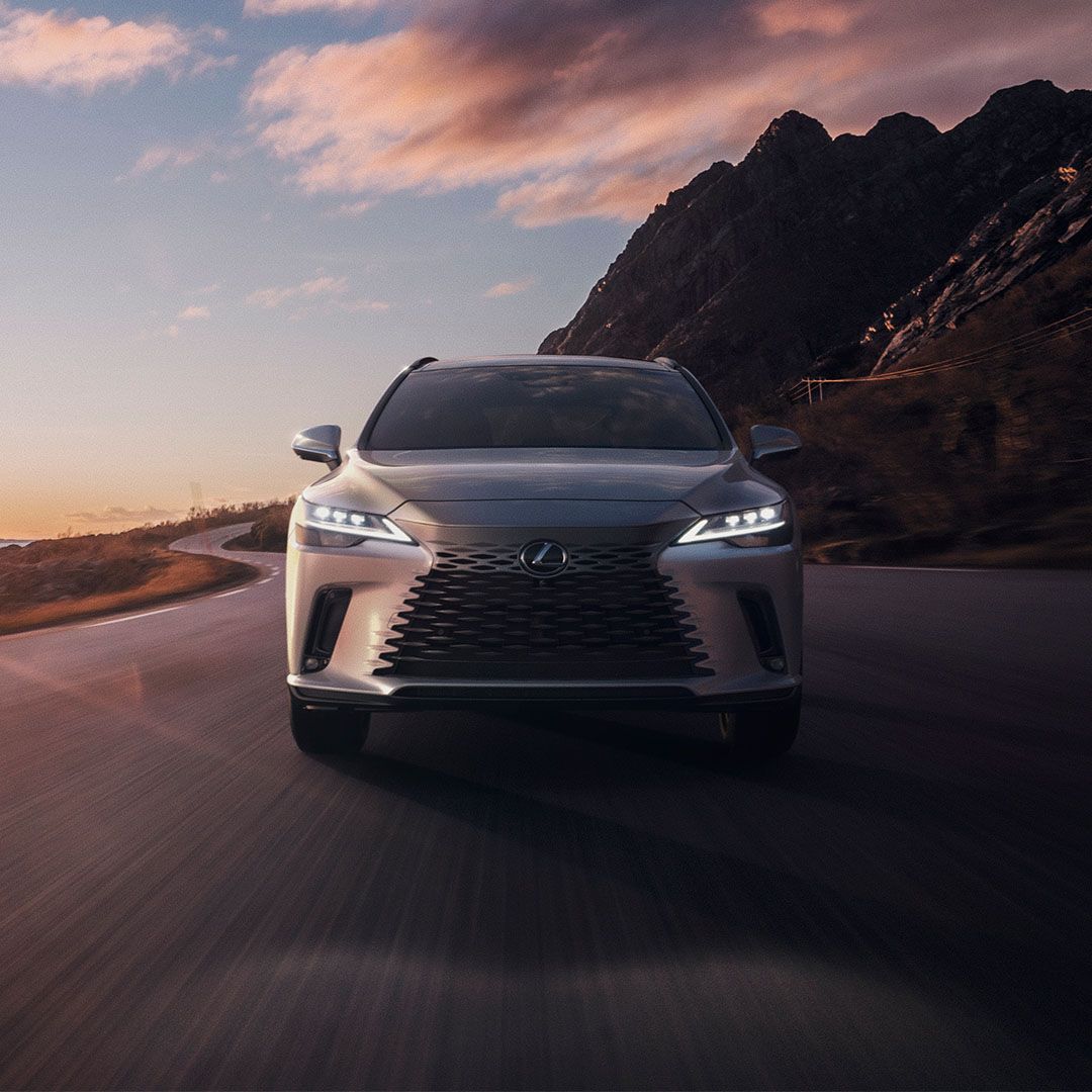 The Lexus RX driving on a mountain road