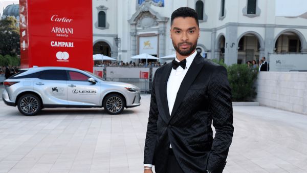 Regé-Jean Page stood infront a Lexus RX at the Venice FIlm Festival