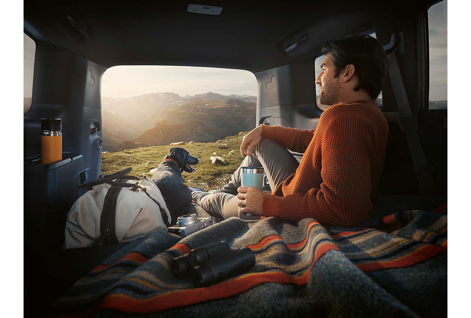 A person sat inside a Lexus GX