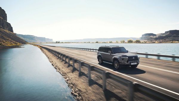 The Lexus GX driving on a coastal road