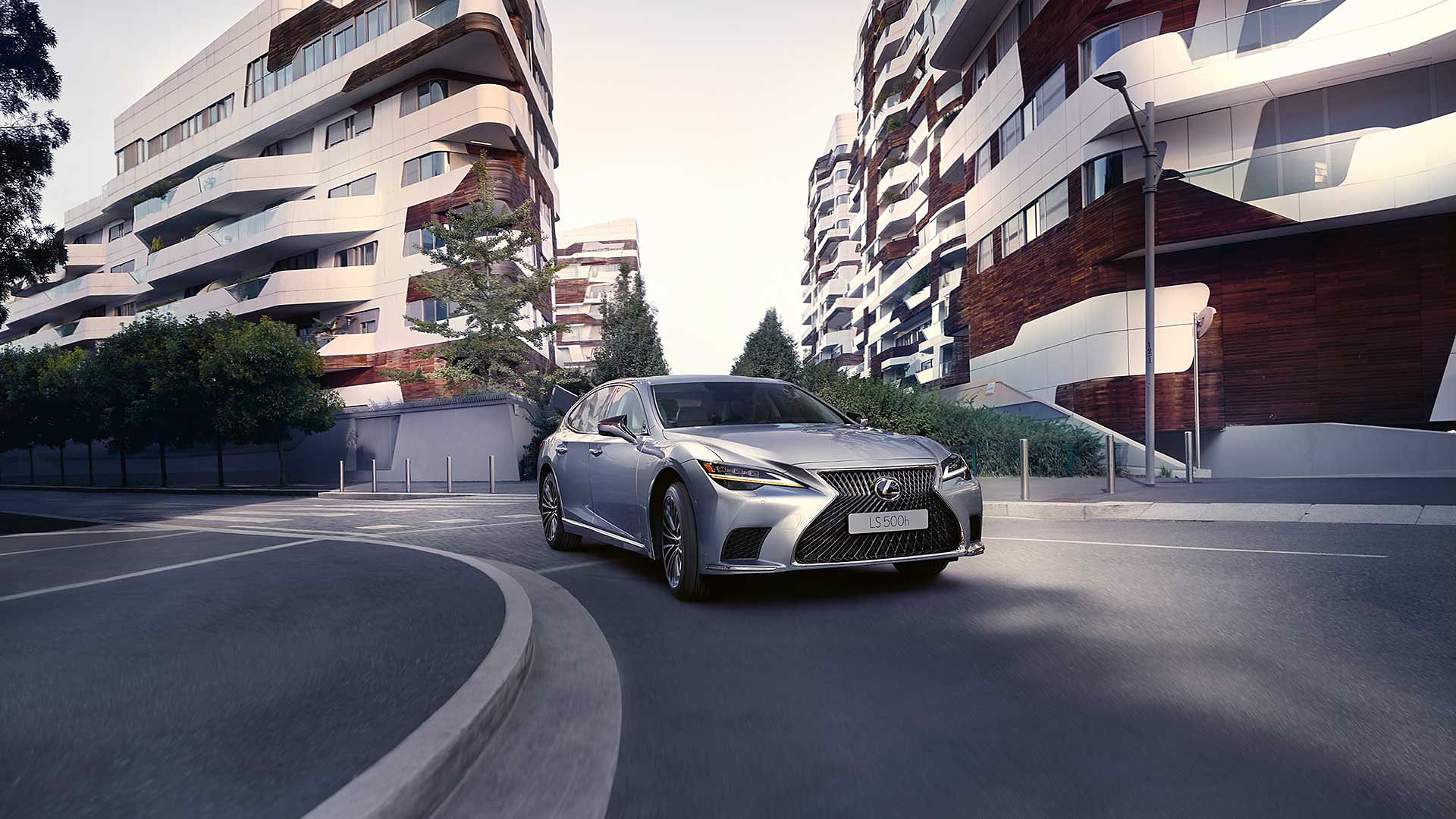 A Lexus LS driving around a corner