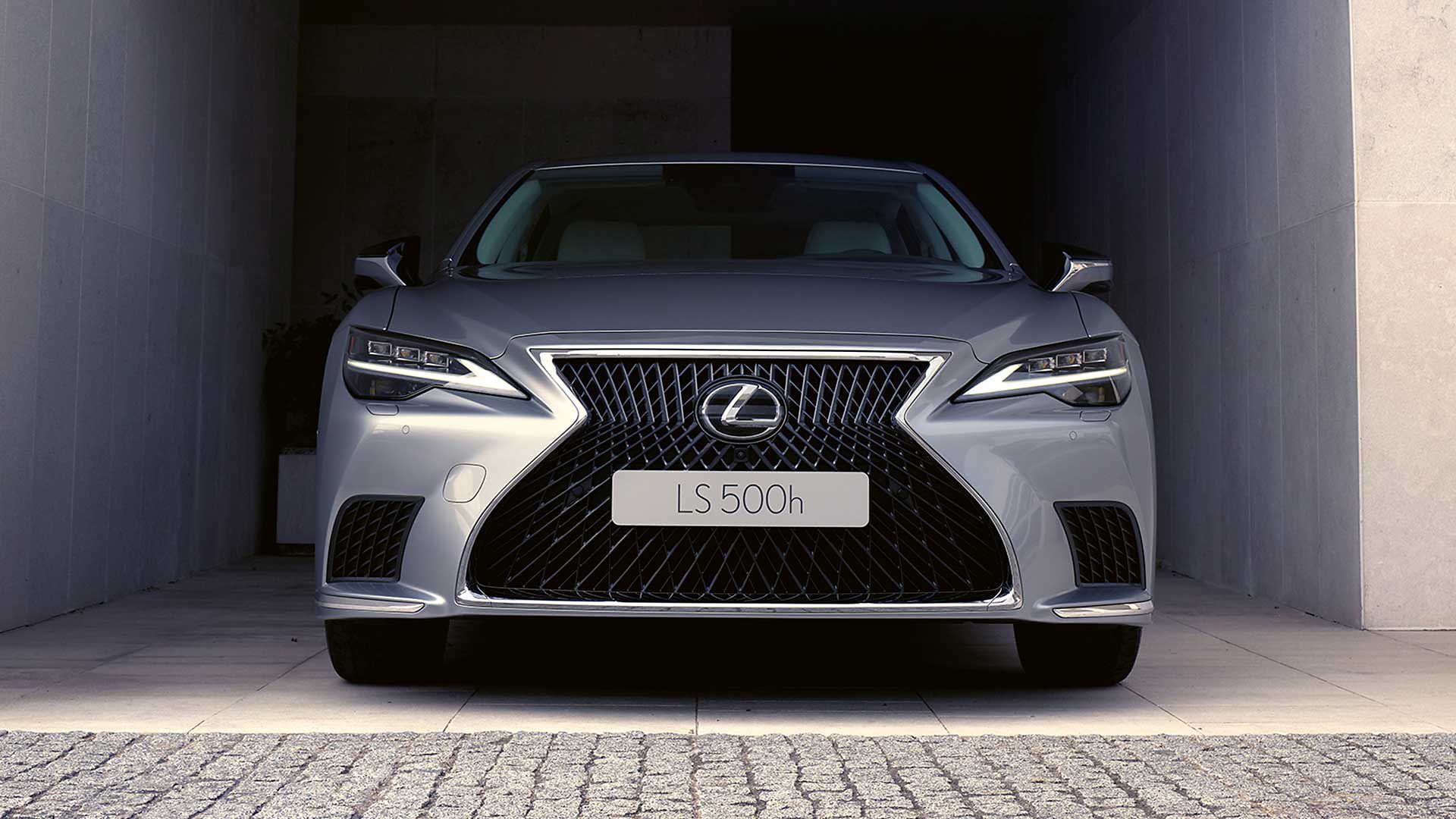 A Lexus LS parked in a garage.