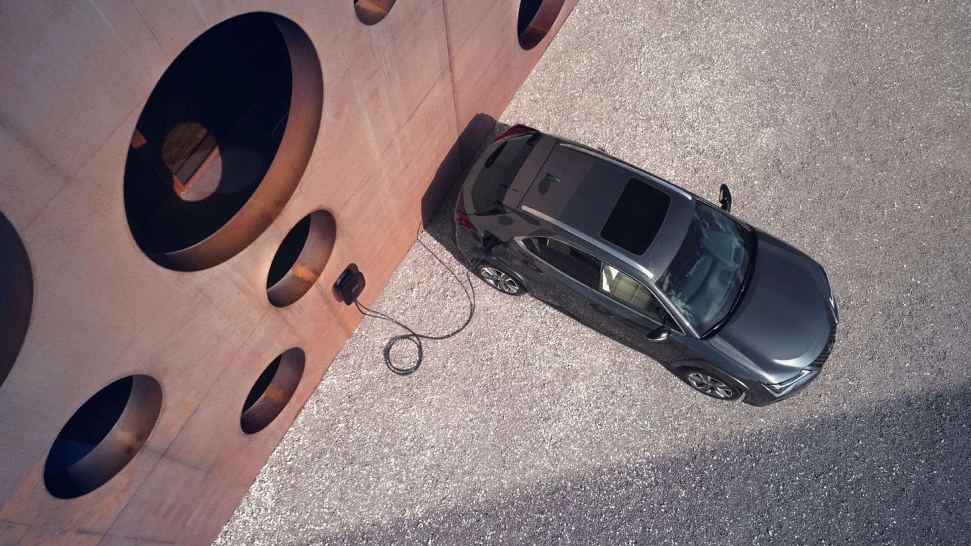 Lexus UX 300e plugged into a Wallbox charger