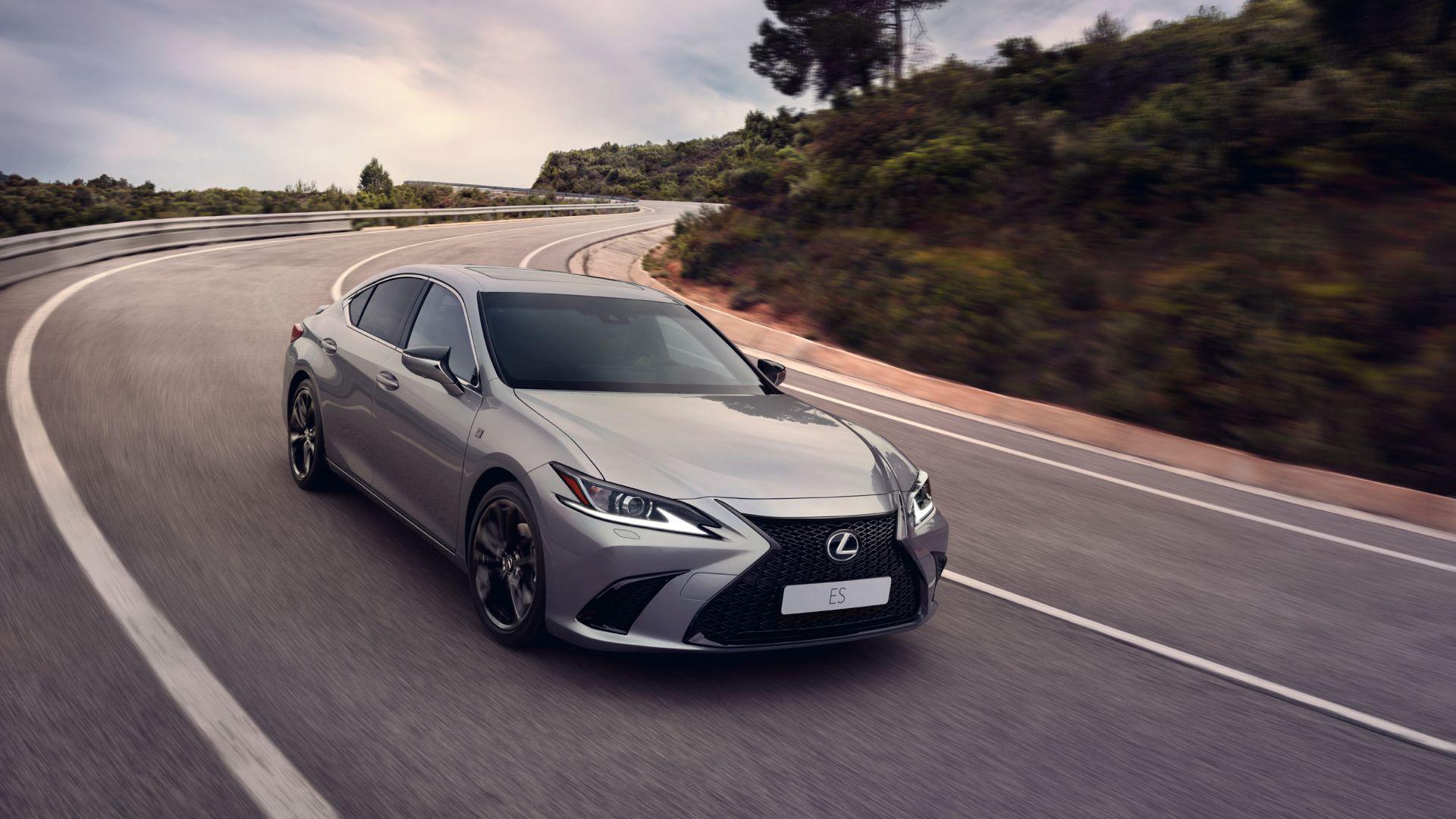 Lexus ES driving on street