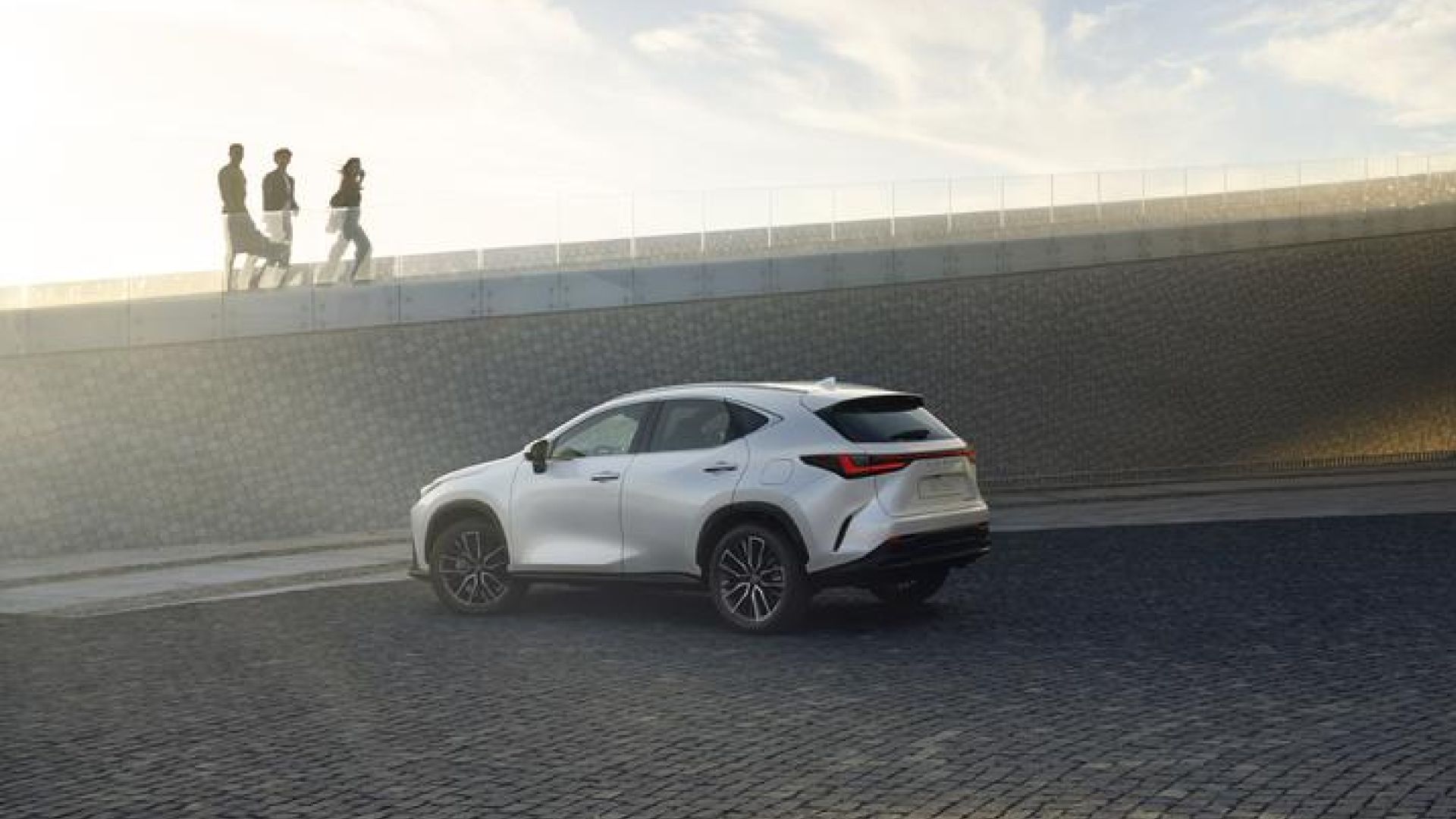 The Lexus UX parked on a beach