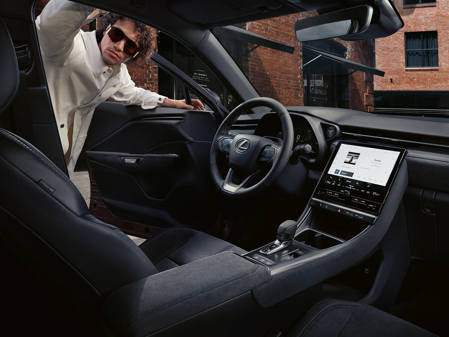 A person looking inside a Lexus