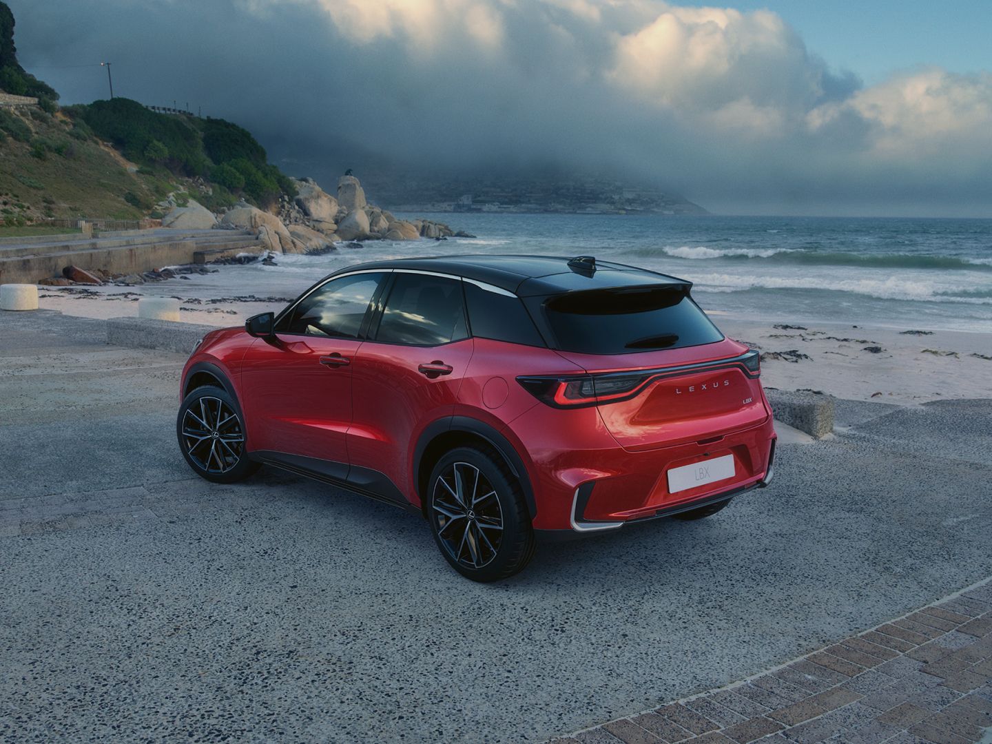 Lexus LBX parked on a coastline