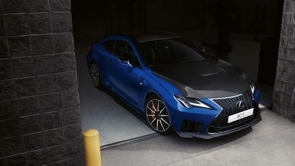 Lexus RC F Track Edition parked in a racing garage