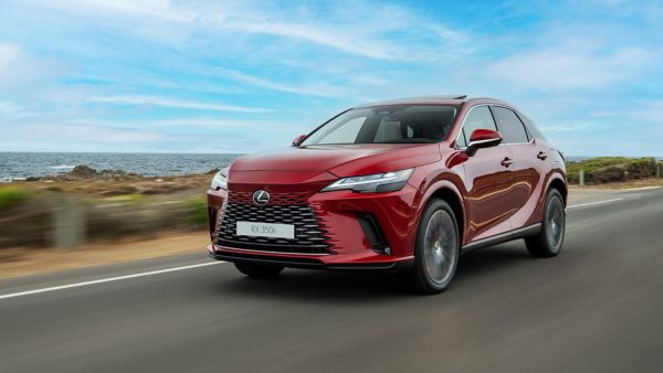 A Lexus RX 350h driving along a coastal road