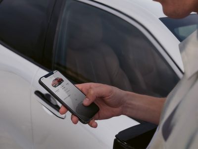 A person using the Lexus Link+ app