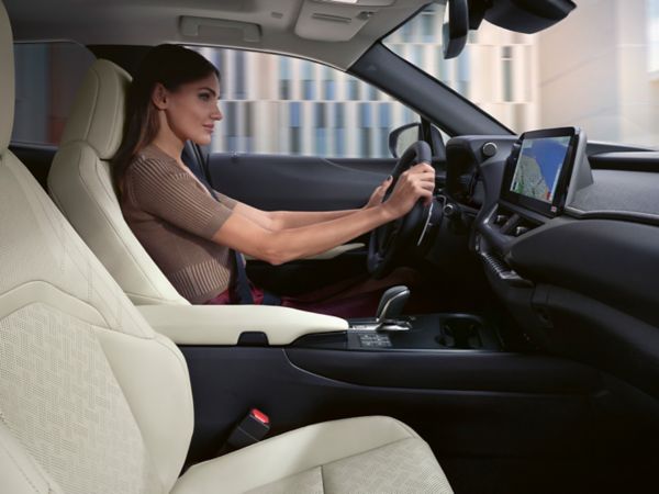 A person sat in a Lexus UX 300e