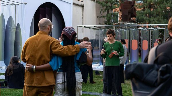 A couple posing for a picture at the Milan Design Week 2024