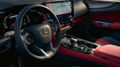 Lexus LX driving on a road 