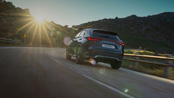 Lexus NX driving on a road