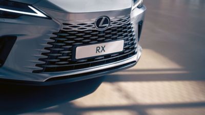 Lexus LX driving on a road 