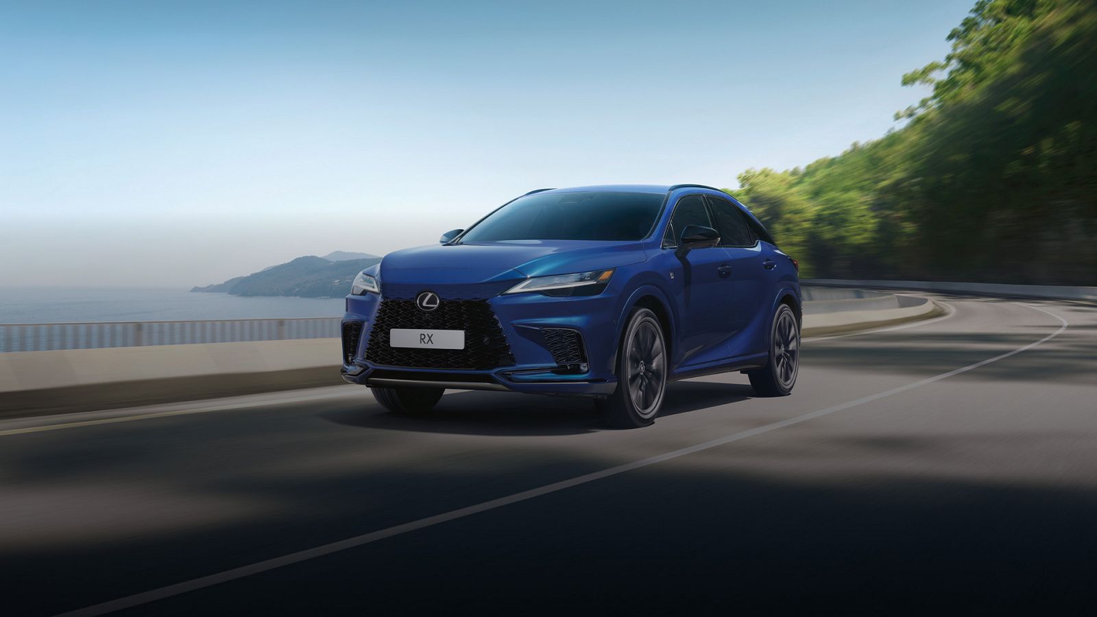 A Lexus RX 500h driving on a coastal road