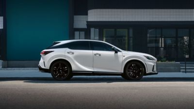 Side view of a Lexus RX parked on a street