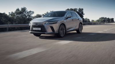 Lexus LX driving on a road 