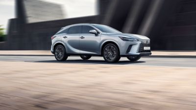 Lexus LX driving on a road 