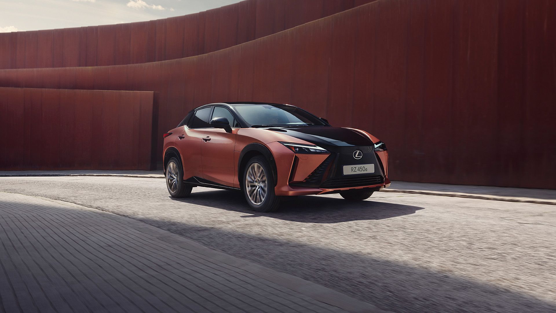 A Lexus RZ 450e parked in a rural location