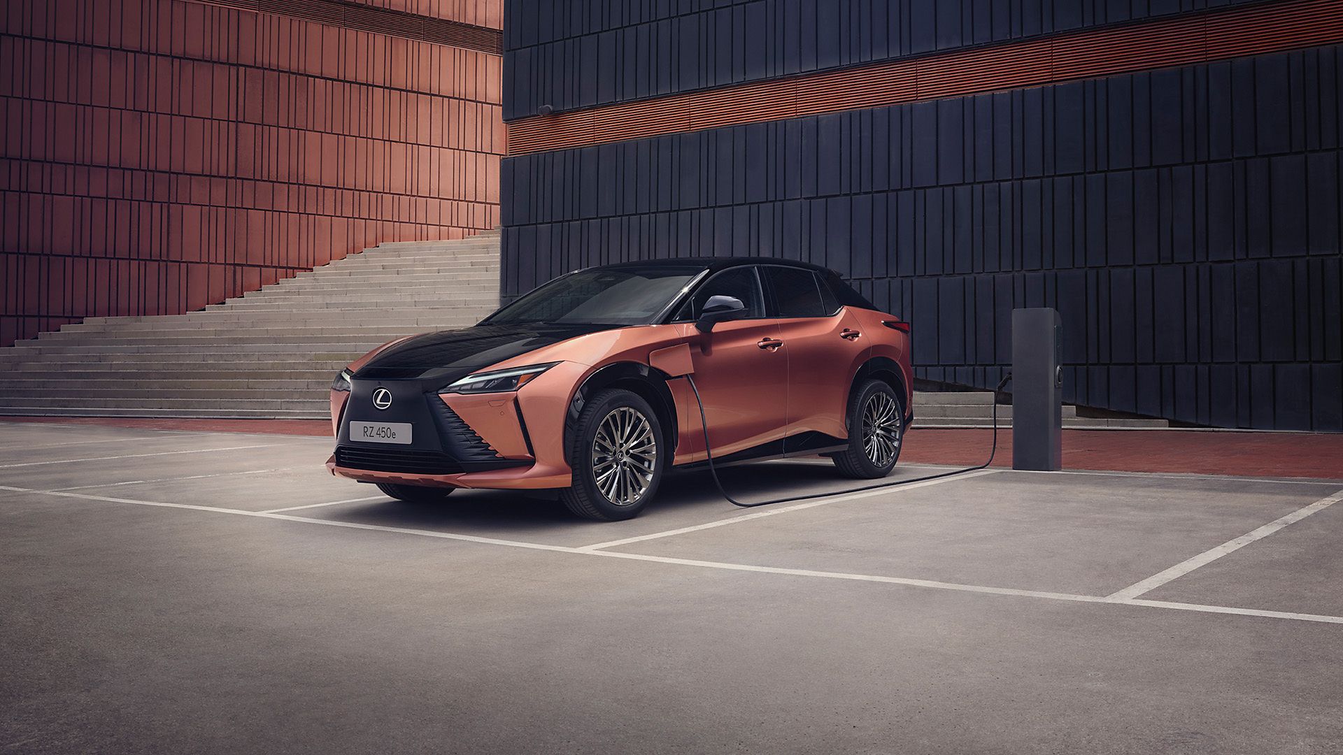Rear view of a Lexus RZ 450e driving