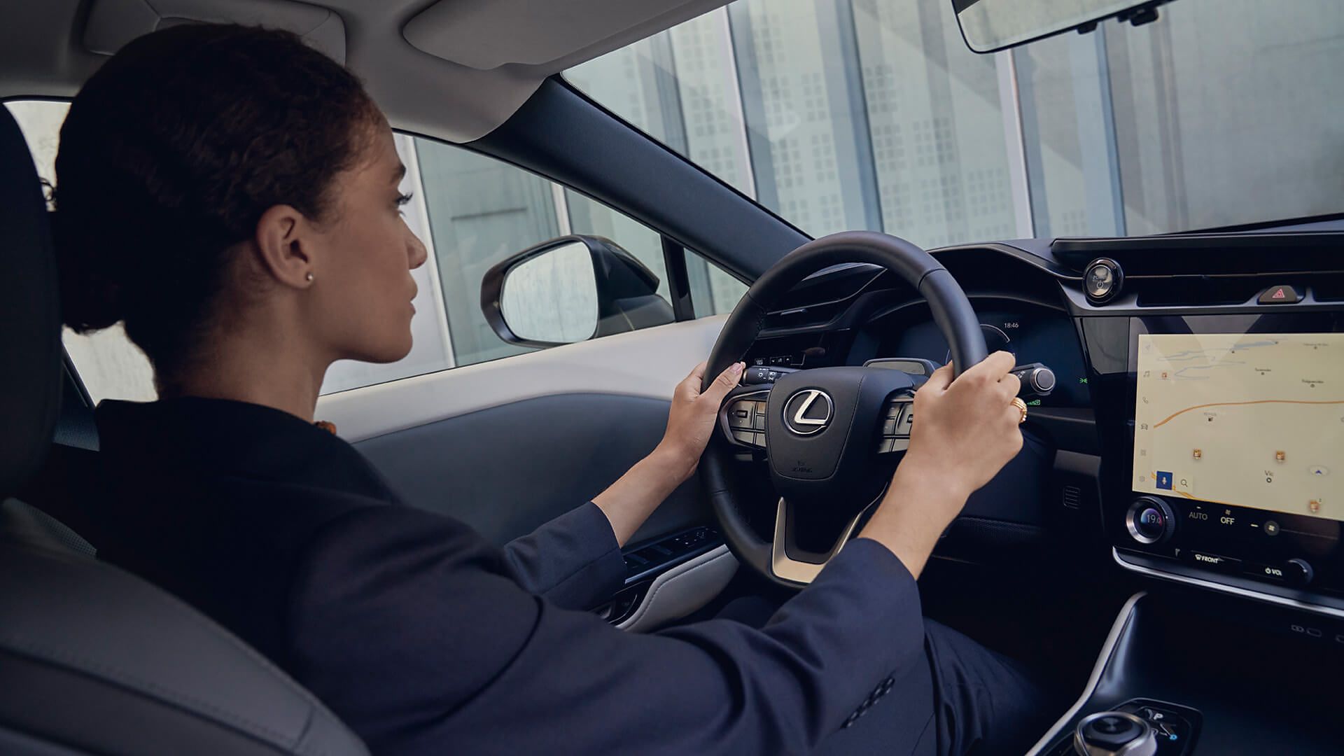 The Safe Exit Assist button within the Lexus RZ 450e door handle 