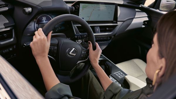 A person driving the Lexus UX 300e