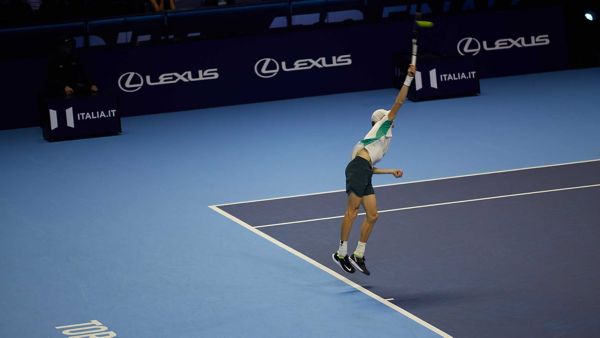 A tennis player jumping during an ATP event.