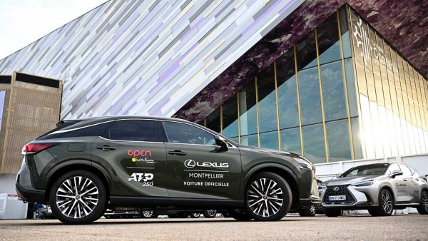 A side view of a Lexus parked at an ATP event