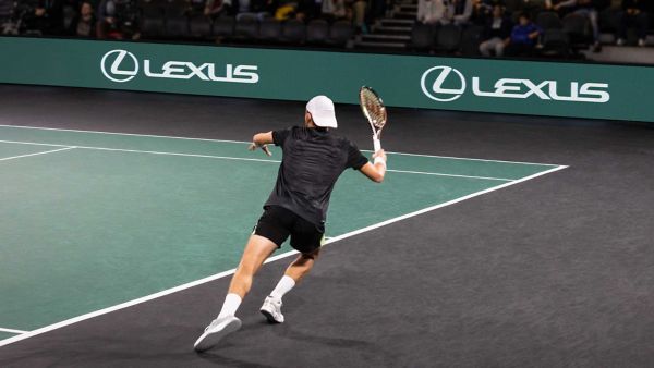 A tennis player in action at an ATP event.