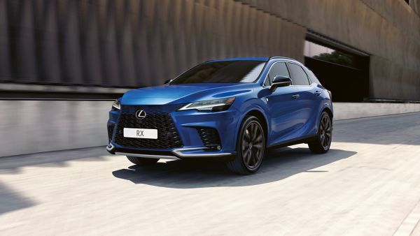 A Lexus RX driving on a road