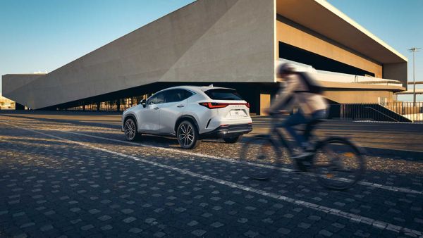 Lexus NX driving in a rural location