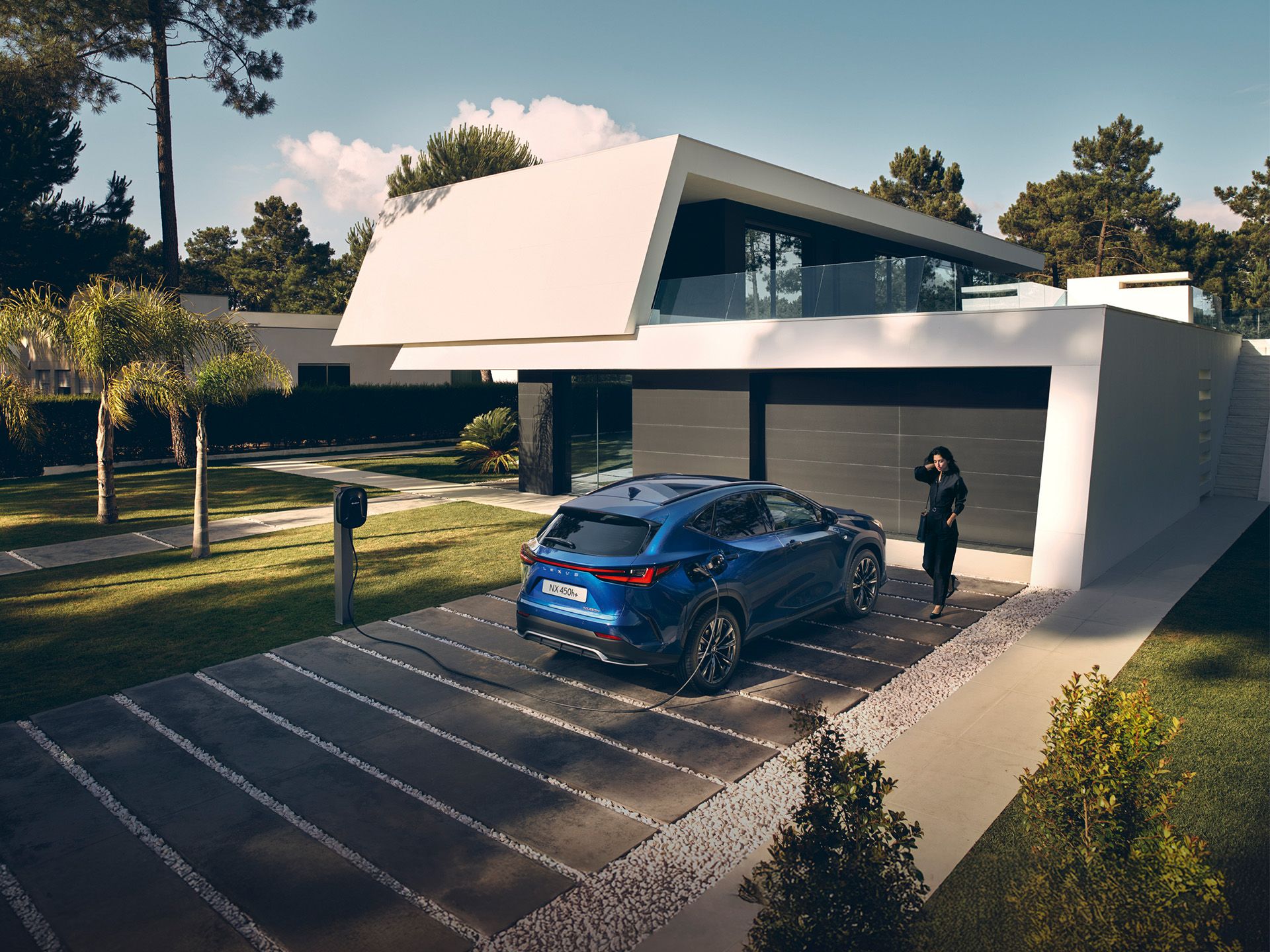 A Lexus NX parked outside a property