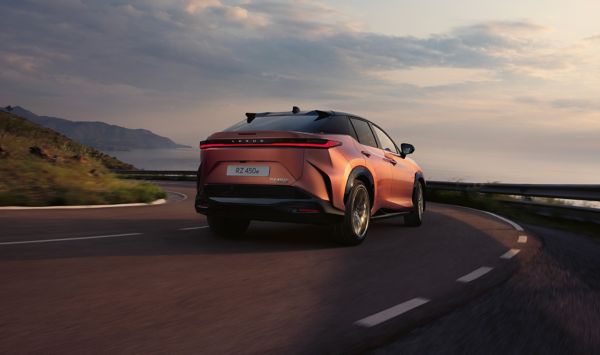 Lexus RZ 450e driving in around a corner