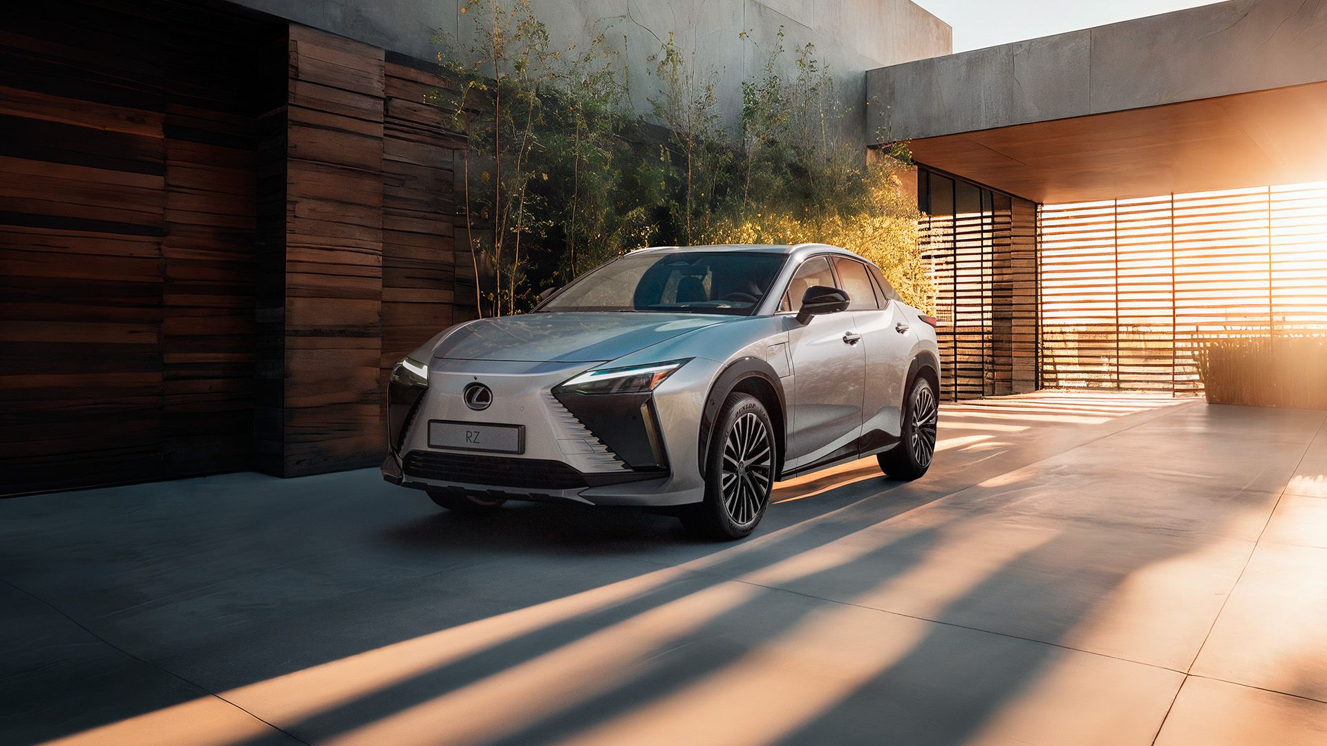 Rear three-quarter view of a parked Lexus UX 300h