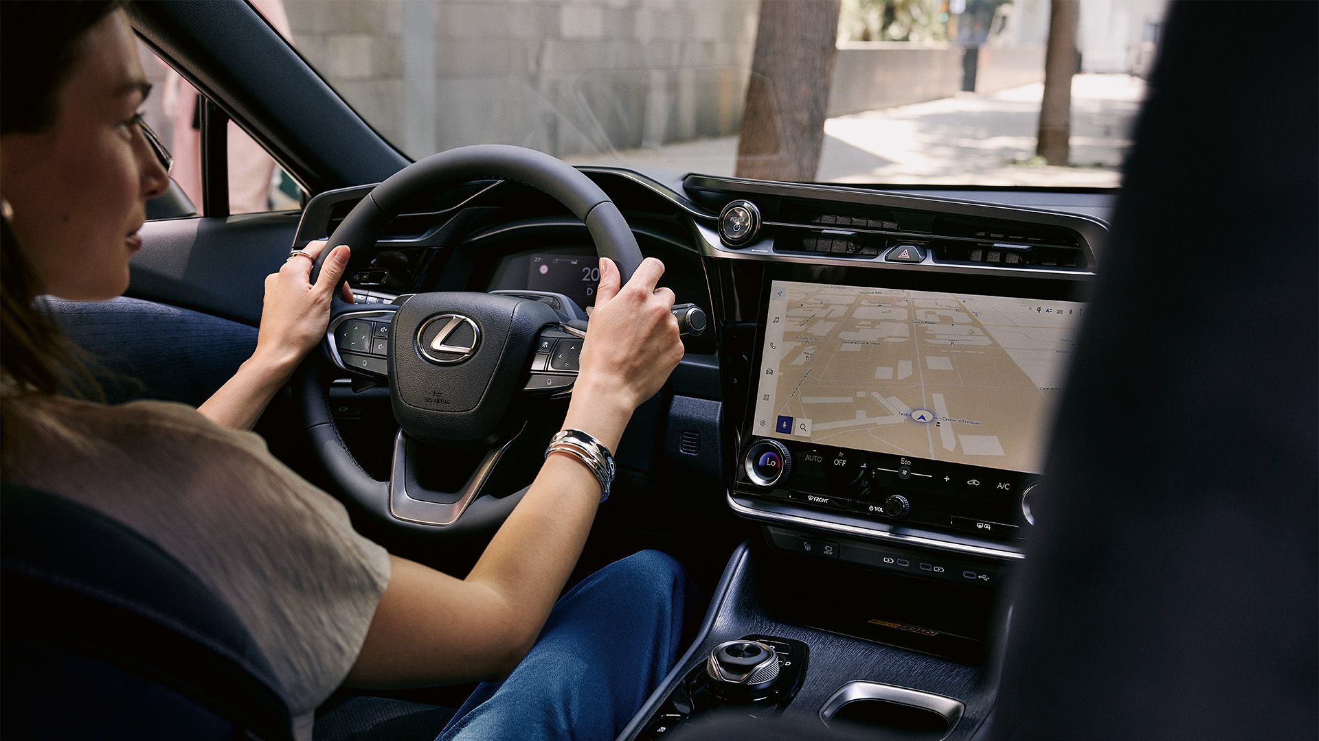 A Lexus RZ450e driving on a road